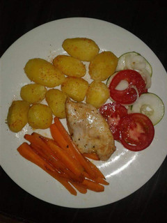 A picture of Chicken Breast with Roasted potatoes.