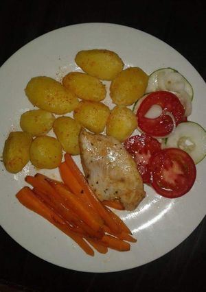 A picture of Chicken Breast with Roasted potatoes.
