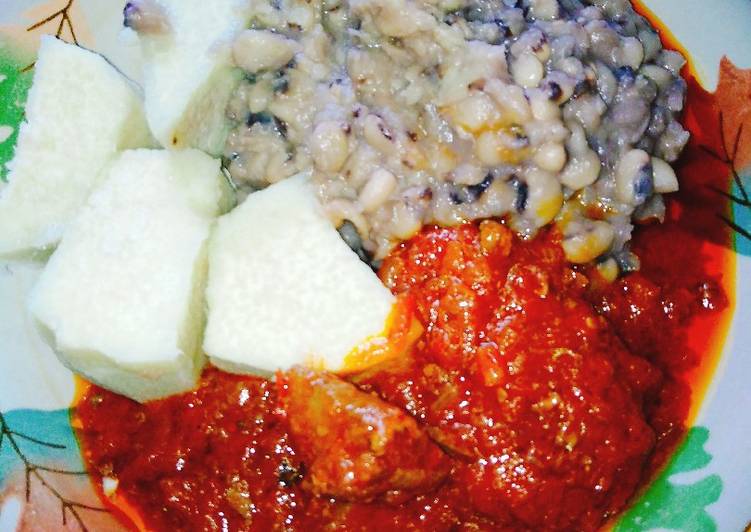 Yam and beans with assorted meat stew