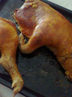 Una foto de Cochinillo asado