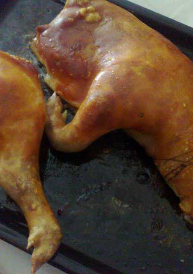 Una foto de Cochinillo asado