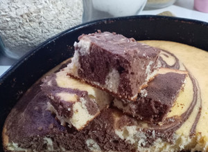 Una foto de Torta marmolada 😋
