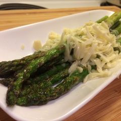 A picture of Kids loves simple taste!! Asparagus and cheese.