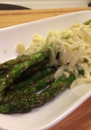 A picture of Kids loves simple taste!! Asparagus and cheese.