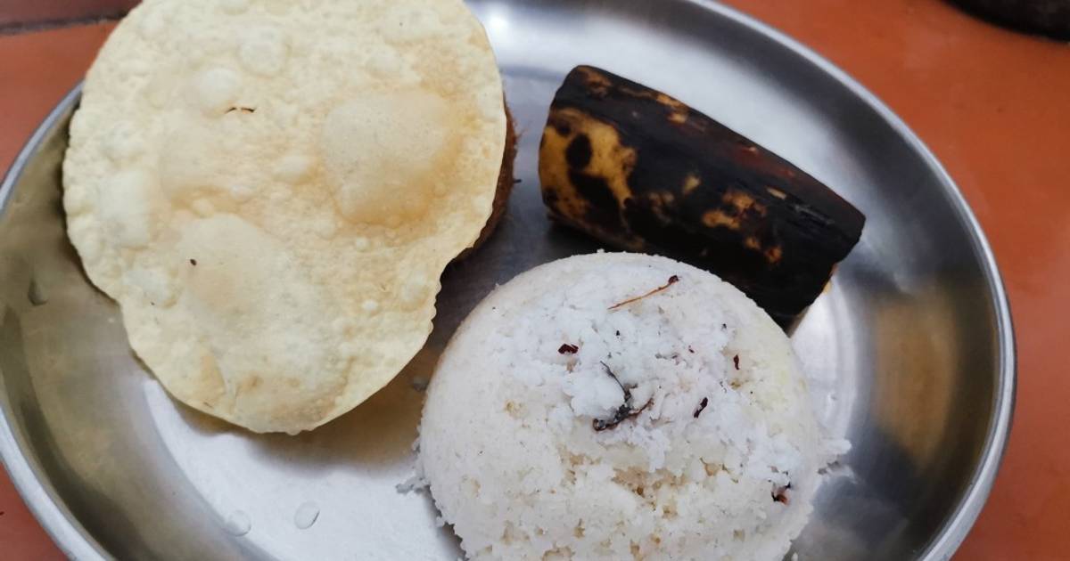 Vattayappam. Steamed Rice Cake Made Of Sweet Fermented Batter Of Rice And  Coconut, Topped With Raisins While Steaming. Traditional Snack From South  Kerala. Shot In White Background Stock Photo, Picture and Royalty