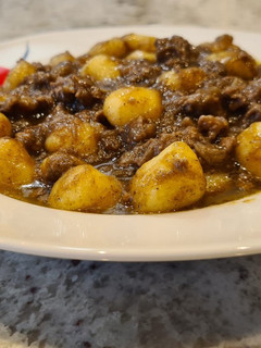 Una foto de Ñoquis en salsa de carrilleras
