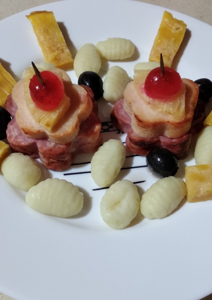 Una foto de Brochetas de aperitivos con ñoquis