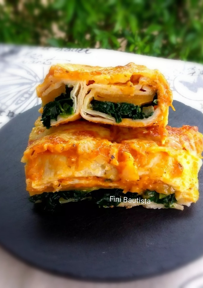 Una foto de Enchilada vegetariana de espinacas