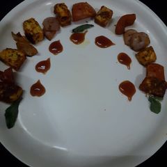 A picture of Paneer tikka with Italian seasoning.