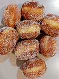 Berlinas de miel con naranja confitada y cardamomo
