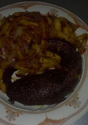 A picture of Grilled fish and potatoes.