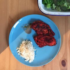 A picture of Chicken Masala & Rice.