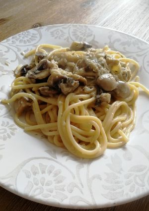 Una foto de Espaguetis con queso brie