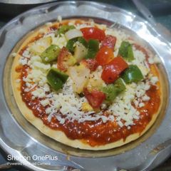 A picture of Homemade panner pizza 🍕.