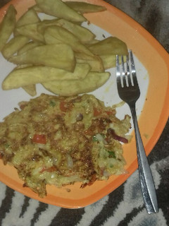 A picture of Sweet potato chips with cabbage omellet and kunun gyada.