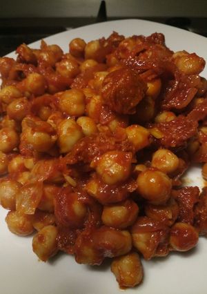 A picture of Chickpea and chorizo tapas.