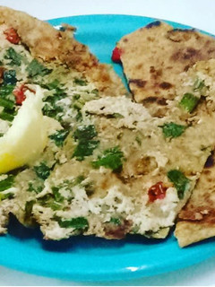 A picture of Aloo and Paneer Paratha.