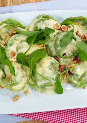 Una foto de Agnolottis verdes de calabaza y ricota