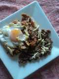 Chilaquiles rancheros con salsa cascabel, pollo y tequila con huevo estilo  Correa. México