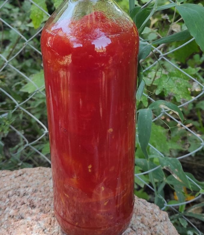 Una foto de Tomates en conserva