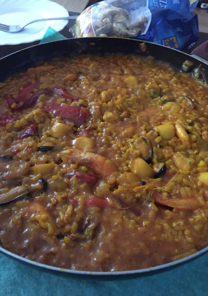 Una foto de Paella de marisco