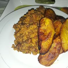 A picture of Porriage beans and fried plantain.