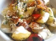 A picture of potato salad with dill