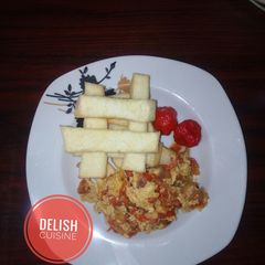 A picture of Fried yam strips with egg sauce.