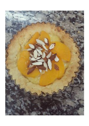 Una foto de Tarta de duraznos y almendras
