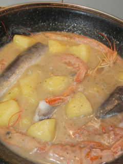 Una foto de Merluza con patatas