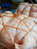 Arrollado huaso picante en pork shoulder