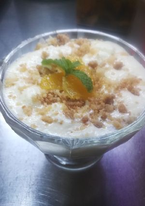 Una foto de Postre de naranja con crumble de limón