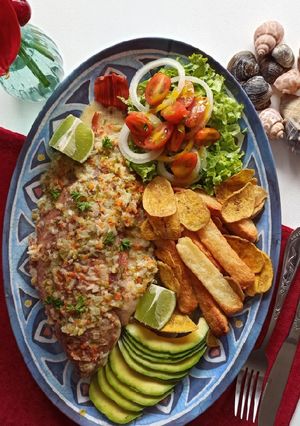 Una foto de Pescado en crema de coco