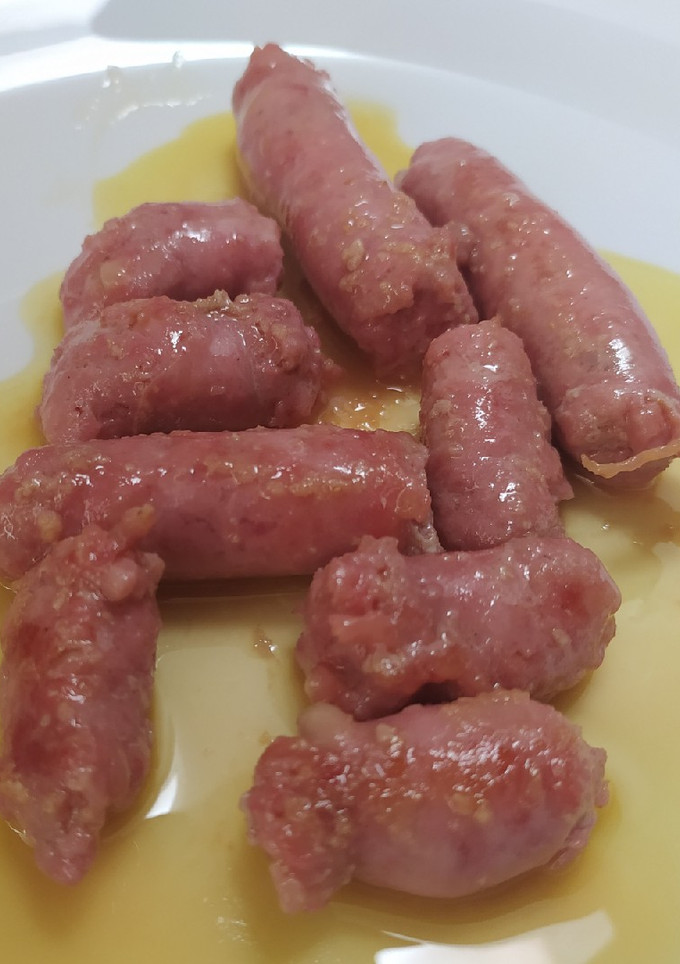 Una foto de Salchichas al vino blanco