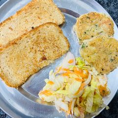 Aloo Tikki with Salad & Bread🥗🥗 A picture of Aloo Tikki with Salad & Bread🥗🥗.