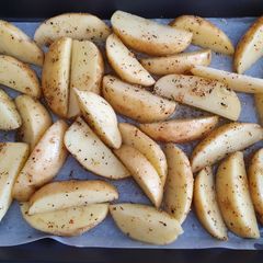 A picture of Homemade wedges with lemon herd.