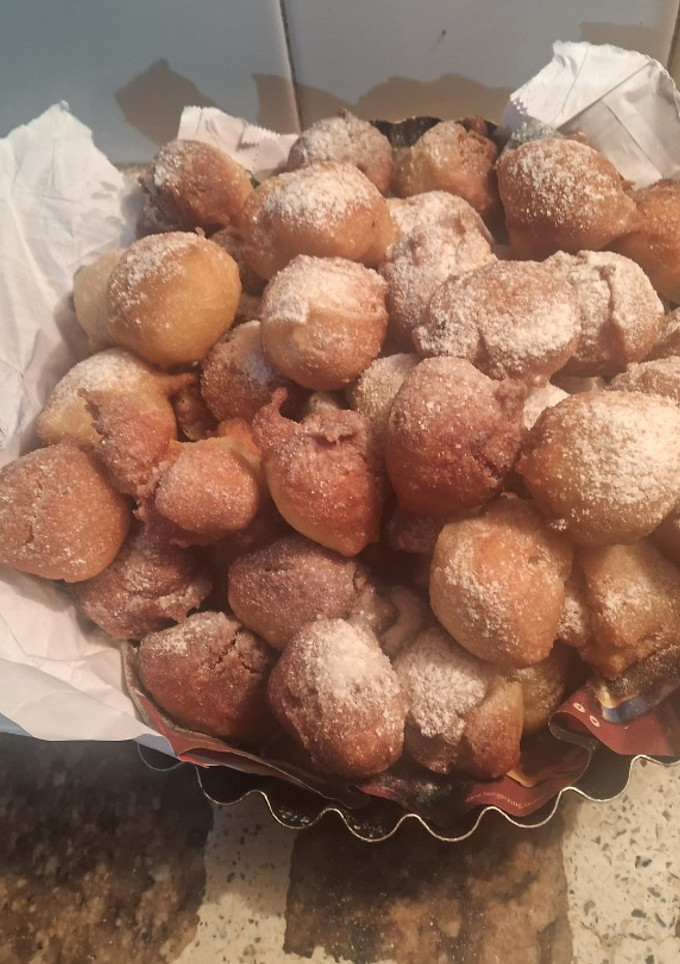 Una foto de Buñuelos de limón y coco