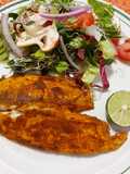 Filete de pescado marinado con ensalada