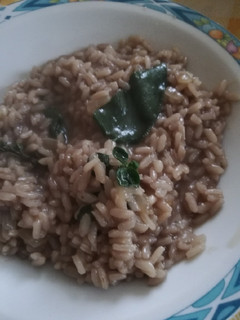 Foto di Risotto al vino rosso ed erbe aromatiche