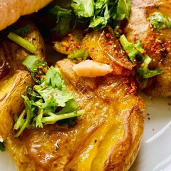 A picture of Crispy Smashed herbed potatoes.