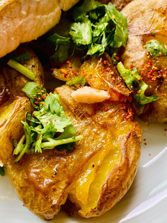 A picture of Crispy Smashed herbed potatoes.