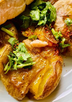 A picture of Crispy Smashed herbed potatoes.