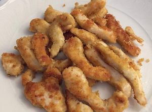 Foto di Straccetti di pollo sabbiosi al grana