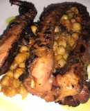 Tentáculos de calamar asados, con garbanzos en salsa romesco