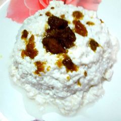 A picture of Leftover rice curd with jaggery.