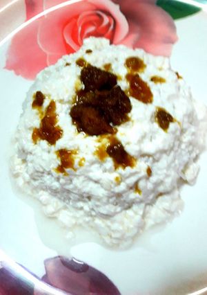 A picture of Leftover rice curd with jaggery.