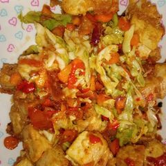 A picture of Awara/tofu with vegetable sauce.