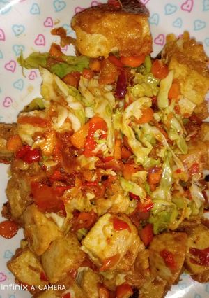 A picture of Awara/tofu with vegetable sauce.