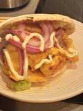 Pita de pollo marinado con especias