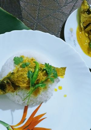 A picture of Bhapa Parshe/ steamed parshe fish in mustard gravy.